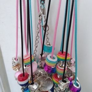 2 Charm Bracelets One charm Necklace & one Pair